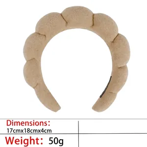 Thick beige cloud headband with soft terry cloth texture measuring 17x18x4cm for facial washing