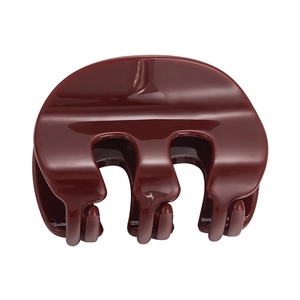 Glossy burgundy M-shaped acrylic hair claw clip with a polished finish on white background