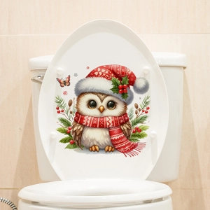 Sticker de toilette chouette de Noël phosphorescente avec bonnet rouge et houx décor