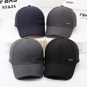 Men's casual cotton baseball caps in multiple colors displayed on a white organizer box