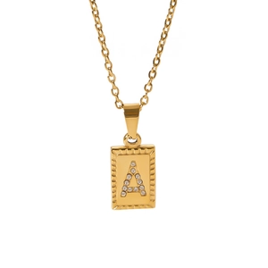 Detailed view of luxury gold letter A pendant necklace with sparkling zircon pavé