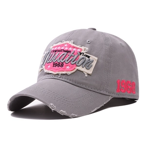 Vintage gray distressed denim baseball cap with pink 1968 embroidery and frayed brim