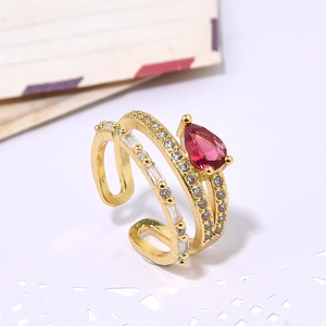 Golden double-layer adjustable open ring featuring a pear-cut red stone and clear zircons