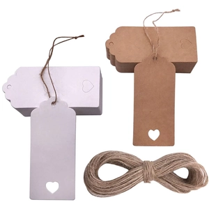 White and kraft heart hollow gift tags with jute twine for weddings and parties