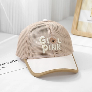Close-up of beige mesh baseball cap with bear embroidery and breathable fabric