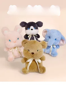 Detailed view of plush animal dolls featuring bear, rabbit, husky, and elephant soft toys