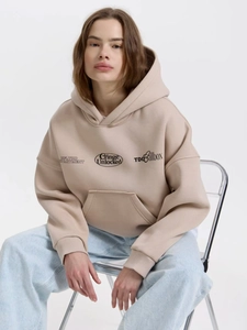 Women's oversized beige hoodie with NFLTRD graphic print and front kangaroo pocket