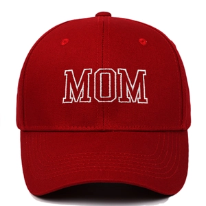 Classic red cotton baseball cap featuring white MOM embroidery with curved brim style