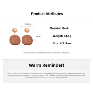 Detail view of brown resin earrings with dimensions 6x3.5cm and 14.5g weight info