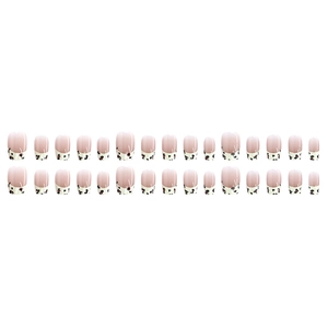 Short French cow print press-on nails with minimalist black and white pattern design