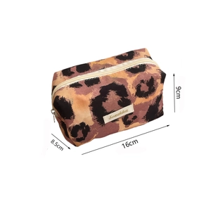 Detail showing dimensions of leopard print stationery bag with dimensions 16x9x8.5cm