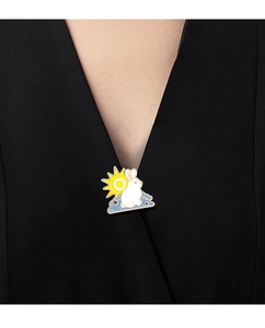 Detail of a rabbit on cloud metal enamel pin badge worn on a black collar