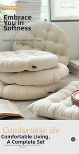 Detail of round and square minimalist Japanese tatami cushions in creamy white linen fabric
