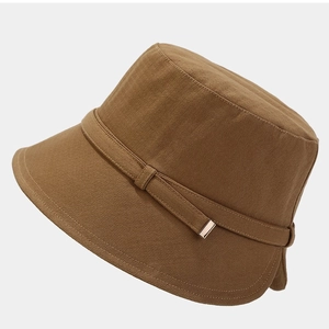 Deep camel cotton bucket hat with textured fabric and vintage gold metal trim