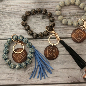 Leopard print wood bead bracelet keychain with tassels and Mama engraved pendant