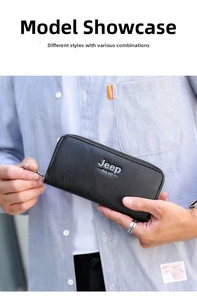 Detail view of a black pebbled leather long wallet for men with secure metal zipper closure