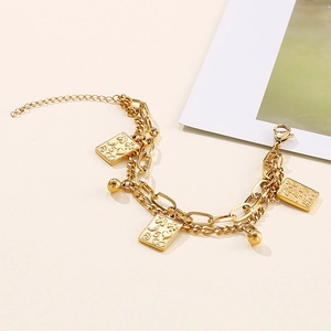 Gold double-layered stainless steel chain bracelet with poker card and bead pendants