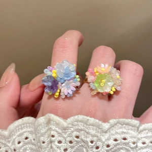 Colorful beaded flower ring for women featuring pastel floral charms and open band design