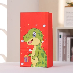 Sac cadeau en papier rouge avec dinosaure de dessin animé pour fêtes d'enfants