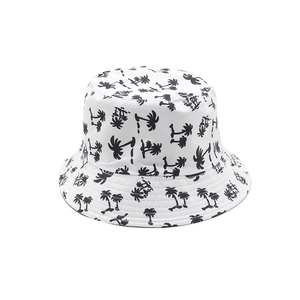White reversible bucket hat with black palm tree print for summer sun protection