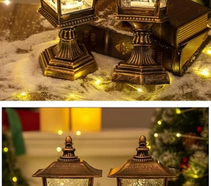 Detail of vintage bronze Christmas lantern with swirling glitter and warm LED light