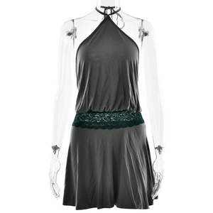 Detail of grey halter mini dress featuring dark green lace patchwork and pleated waist design
