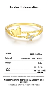 Detail view of gold-plated S925 silver double butterfly ring with cubic zirconia
