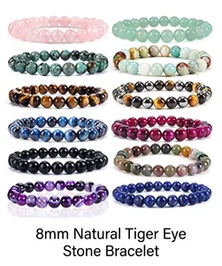 Macro view of twelve assorted 8mm natural stone beaded bracelets in various colors