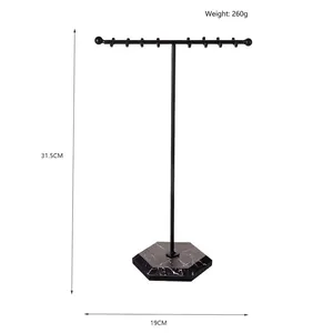 Detail view of T-bar jewelry stand with 31.5cm height and black marble base
