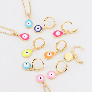Golden Evil Eye jewelry set featuring pendants and earrings in seven vibrant colors