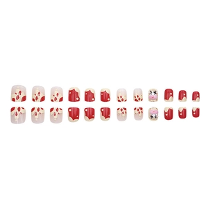 Cute cartoon press-on nails set with red cow patterns and 3D cow head designs