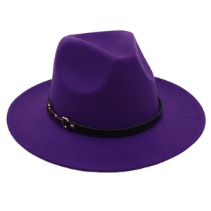 Close-up of a purple wool fedora hat with a black leather band and gold metal buckle