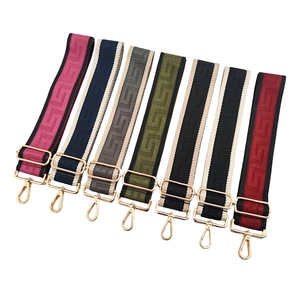 Adjustable 5cm wide jacquard crossbody strap with geometric pattern and gold hardware