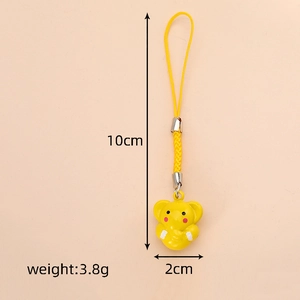 Detailed view of yellow elephant pendant with 10cm length and 3.8g weight specs