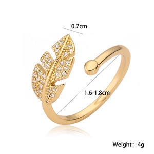 Detail view of 18K gold plated leaf ring with zircon inlay and product dimensions