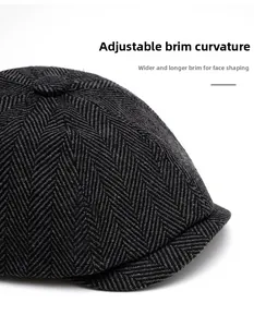 Detail of herringbone tweed newsboy cap with wide foldable brim for face contouring