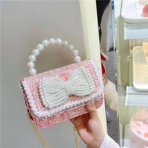 Sac à main en tweed rose pour enfant avec nœud en perles et poignée élégante