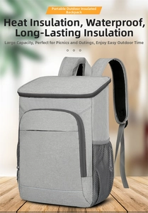 Close-up of waterproof grey thermal backpack with reflective strip on a wooden deck
