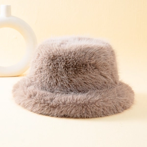 Thick warm taupe faux fox fur bucket hat for winter featuring plush texture
