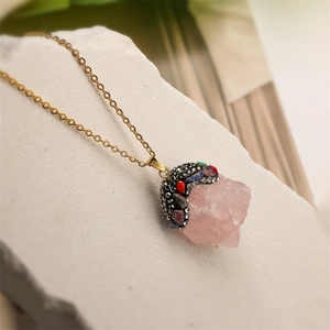 Natural raw pink crystal pendant necklace with colorful rhinestones on a gold chain