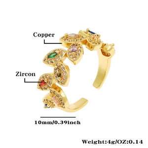 Detail view of 10mm wide copper ring with multi-color zircon marquise leaves