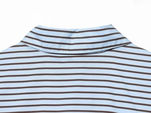 Close-up of the polo collar and striped poplin fabric with fine stitching details