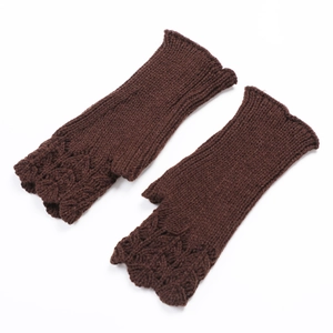 Detailed knit texture of dark brown fingerless winter gloves with thumb hole opening