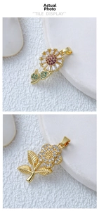 Detailed close-up of 18k gold flower pendants with red and white zircon stone inlay