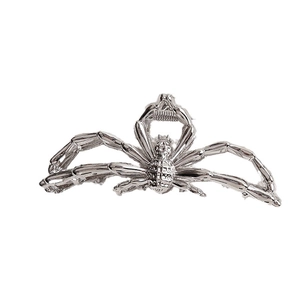 Silver spider metal hair claw clip with large shark clip design in minimalist style