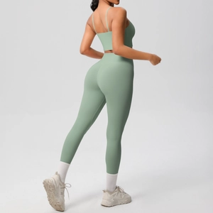 Detailed back view of light green seamless yoga set with thin straps and high waist