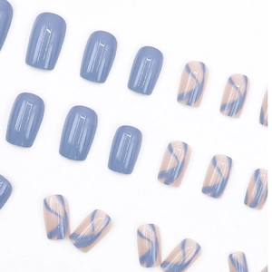 Medium long square oval press-on nails in dusty blue and nude with abstract wavy lines