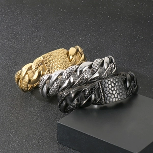 Detailed view of 25mm Cuban chain bracelets in gold silver and black with stone texture