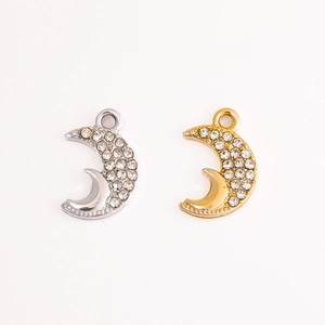 Sparkling crescent moon pendants with inset rhinestones in gold and silver finishes