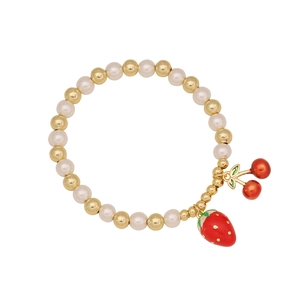 Sweet beaded bracelet with white pearls, gold beads, and red cherry strawberry charms